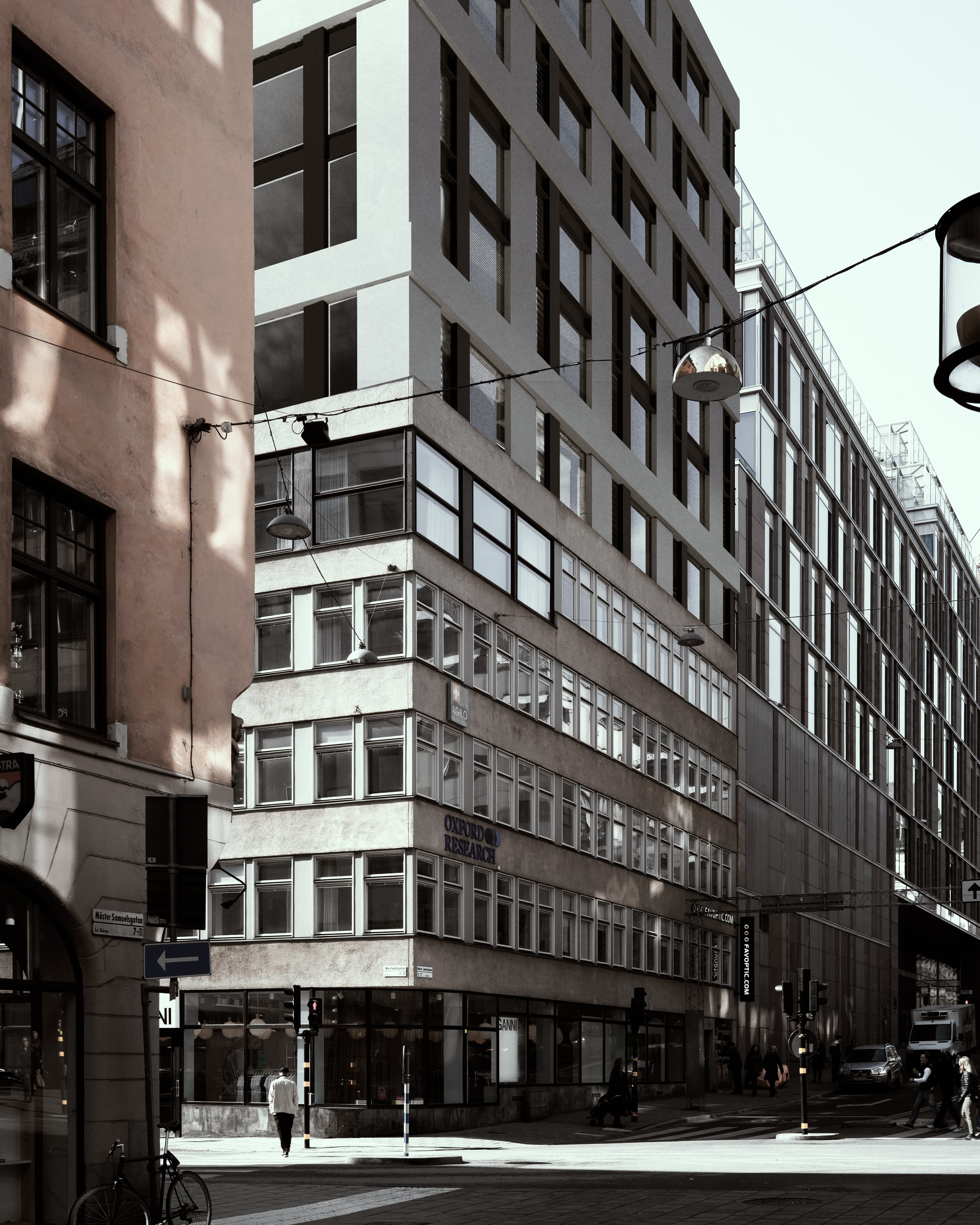 Street view of host building with rooftop addition