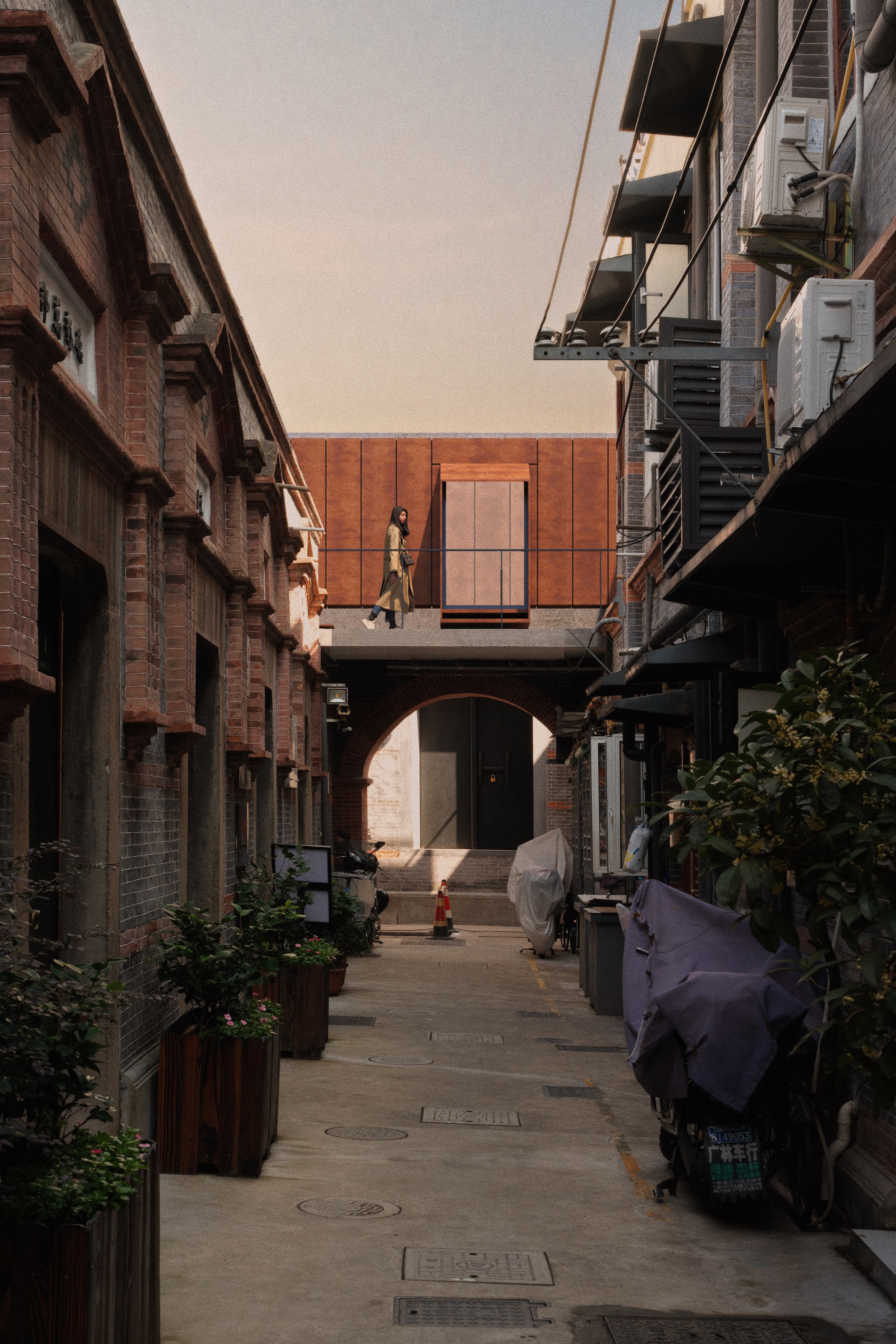Corten steel insertion spanning a lilong alley