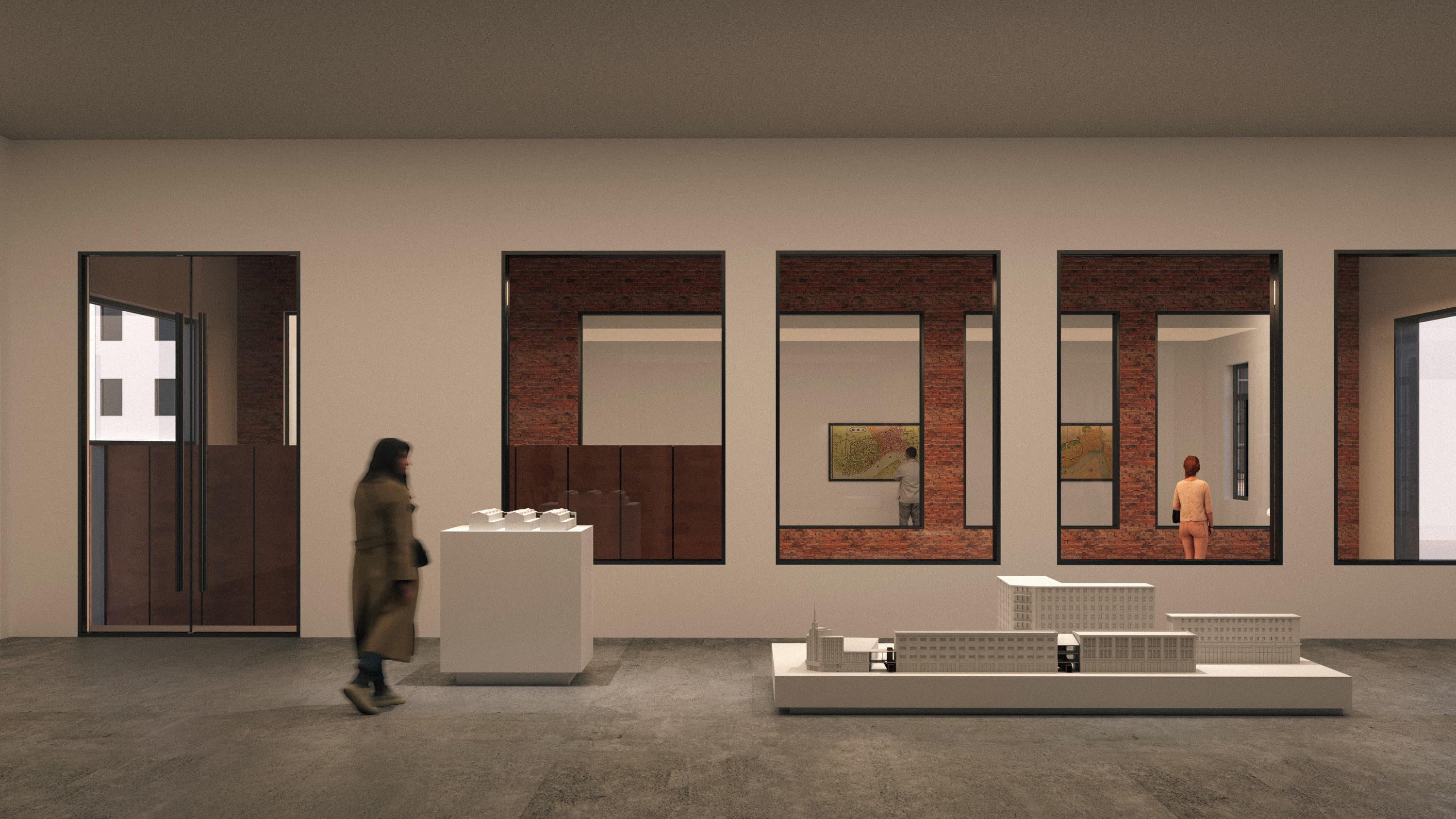 Gallery interior with brick-framed openings and models